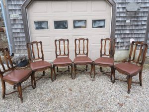 Set of Six Antique Dining Chairs | Upholstered in a Greenhouse Fabrics Faux Leather | Trimmed with Natural Finish Decorative Steel Nails | Upholstered by Cape Cod Upholstery Shop | Located in South Dennis, MA