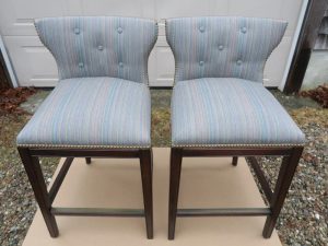 Kitchen Island Stools Ready for Delivery | Detailed with Decorative Brass Nail Trim | Upholstered in Sunbrella Escapade-Electro | Upholstered by Cape Cod Upholstery Shop | Located in South Dennis, MA