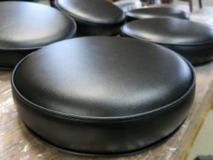 Round Black Vinyl Bar Stool Seats | Boxed Style Seats with Welting Top and Bottom | Upholstered by Cape Cod Upholstery Shop | Located in South Dennis, MA