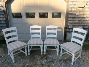Set of four kitchen chairs | Upholstered in a Sunbrella stripe | Upholstered by Cape Cod Upholstery Shop | Located in South Dennis, MA