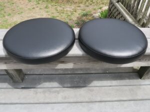 Round Bar Stool Seats with 2" Boxing | Upholstered in black vinyl | Upholstered by Cape Cod Upholstery Shop | Located in South Dennis, MA 02660