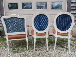 Chair backs upholstered with Batik Fabric imported from India | French arm and side chairs, upholstered in their original genuine leather, were part of This Old House Concord Cottage Season 25 | Batik fabric backs Upholstered by Cape Cod Upholstery Shop | Located in South Dennis, MA 02660