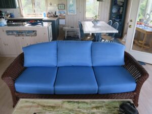 Ficks Reed Wicker Sofa | Freshly painted with a Benjamin Moore acrylic enamel paint by Dip N' Strip in Hyannis, Ma | Cushion Covers upholstered in a Performance JF Fabric | Upholstered by Cape Cod Upholstery Shop | Located in South Dennis, MA 02660