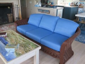 Ficks Reed Wicker Sofa | Freshly painted with a Benjamin Moore acrylic enamel paint by Dip N' Strip in Hyannis, Ma | Cushion Covers upholstered in a Performance JF Fabric | Upholstered by Cape Cod Upholstery Shop | Located in South Dennis, MA 02660