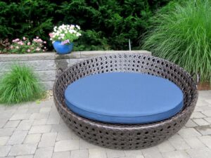 Pool-side outdoor daybed used as a therapy cushion for a special needs customer. Outer cushion fabric is a Sunbrella Spectrum Indigo indoor-outdoor fabric. Under cushion cover made with BellBloc-68 waterproof fabric liner. Foam cushion core is 3" antibacterial marine foam from Sailrite. Upholstered by Cape Cod Upholstery Shop | Located in South Dennis, MA 02660.