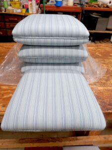 Set of 6 Sunbrella Striped dining seats ready to be delivered. Upholstered in a discontinued Sunbrella Stripe from the Sunbrella Elements Collection | Upholstered by Cape Cod Upholstery Shop | Located in South Dennis, MA 02660