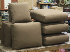 Seat and Back cushions for a wicker sofa | Cushion covers made using Sunbrella Canvas Chestnut color | Upholstered by Cape Cod Upholstery Shop | Located in South Dennis, MA 02660