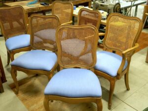 Set of 6 cane back dining chairs | Removable slip seats upholstered in a Sunbrella Oasis-Ocean fabric | Upholstered by Cape Cod Upholstery Shop | Located in South Dennis, MA 02660