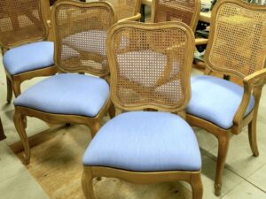 Set of 6 cane back dining chairs | Removable slip seats upholstered in a Sunbrella Oasis-Ocean fabric | Upholstered by Cape Cod Upholstery Shop | Located in South Dennis, MA 02660