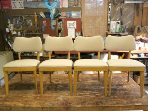 Set of 4 vintage Heywood Wakefield chairs | Upholstered in a Sunbrella Spectrum-Sand fabric | Upholstered by Cape Cod Upholstery Shop | Located in South Dennis, MA 02660