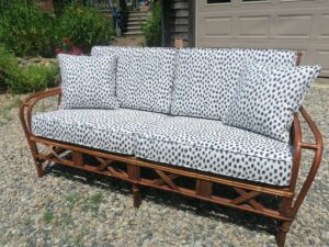 Rattan Sofa. Cushions fabricated using Sunbrella Agra Indigo and new high density foam wrapped in dacron. Cushions fabricated by Cape Cod Upholstery Shop | Located in South Dennis, MA 02660