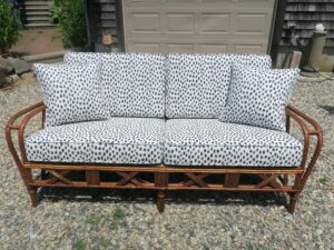 Rattan Sofa. Cushions fabricated using Sunbrella Agra Indigo and new high density foam wrapped in dacron. Cushions fabricated by Cape Cod Upholstery Shop | Located in South Dennis, MA 02660
