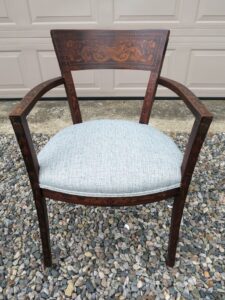 Antique arm chair with wood inlay throughout. Upholstered in a Greenhouse Fabric Crypton fabric. Photo orientation is portrait view. Upholstered by Cape Cod Upholstery Shop | Located in South Dennis, MA 02660