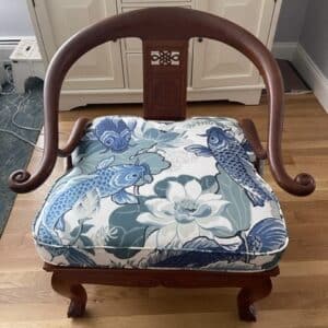 Chines Style Horseshoe Chair with a loose seat cushion | Loose seat cushion fabricated with a Greenhouse Fabrics Nile Blue fish and lotus flower print | Cushion fabricated by Cape Cod Upholstery Shop | Located in South Dennis, MA 02660