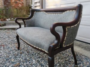 Antique Mahogany loveseat Circa 1020-1930. Upholstered with decorative nails in a style in memory of the customers grandmother. Upholstered by Cape Cod Upholstery Shop | Located in South Dennis, MA 02660