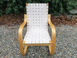 Aalto lounge chair affectionately called the "Pension Chair" by Finland design visionary Alvar Aalto | Solid Birch frame | New wool/cotton Artek natural/white webbing | Birch frame refinished by Wesley Woodworking in Orleans, Ma | Webbing installed by Cape Cod Upholstery Shop | Located in South Dennis, MA 02660