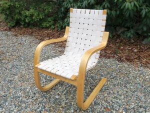 Aalto lounge chair affectionately called the "Pension Chair" by Finland design visionary Alvar Aalto | Solid Birch frame | New wool/cotton Artek natural/white webbing | Birch frame refinished by Wesley Woodworking in Orleans, Ma | Webbing installed by Cape Cod Upholstery Shop | Located in South Dennis, MA 02660