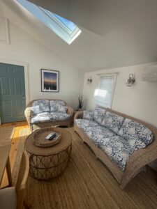 Wicker Set Photo #1. Wicker sofa and love seat with loose seat and back cushions. Cushion covers fabricated with a screen printed blue & white floral print. Cushions fabricated by Cape Cod Upholstery Shop | Located in South Dennis, MA 02660