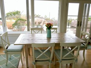 Set of 6 Dining room chairs overlooking sand dunes and Atlantic ocean. Loose cushions with ties, fabricated using a tweed style fabric and 2.5" foam and dacron. Cushions fabricated by Cape Cod Upholstery Shop | Located in South Dennis, MA 02660
