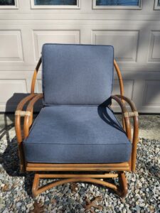 Rattan chair with loose boxed style cushions. Cushions fabricated using a Greenhouse Fabric solid blue performance Fabric. Cushions fabricated by Cape Cod Upholstery Shop | Located in South Dennis, MA 02660 Cushions fabricated by Cape Cod Upholstery Shop | Located in South Dennis, MA 02660