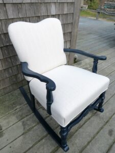 Vintage rocking chair Circa 1940s with a rich blue painted finish. Upholstered using a Greenhouse Fabrics neutral herringbone stripe fabric. Upholstered by Cape Cod Upholstery Shop | Located in South Dennis, MA 02660