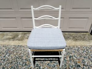 One of a set of 8 rush seat ladder back dining chair cushions. Cushions fabricated using a customer supplied Delany & Long Houseboat Navy/Bluebird fabric. Cushions fabricated by Cape Cod Upholstery Shop | Located in South Dennis, MA 02660