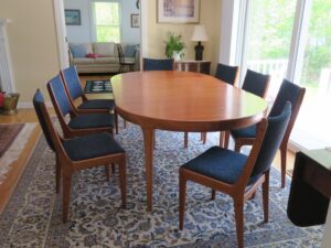 Johannes Anderson Uldum Mobelfabrik chairs model # 7171 Uldum. Matching oval table. Made in Denmark. Upholstered in a United Fabrics rich blue Crypton performance fabric. All new 2.6 high density foam. Upholstered by Cape Cod Upholstery Shop | Located in South Dennis, MA 02660