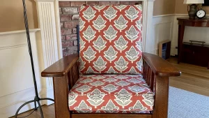 Antique Morris Chair with a solid Oak frame and loose seat and back Cushions. All new seat and back CertiPur-US foam inserts. Cushions upholstered using a Kate Scarlet Floral fabric. Cushions fabricated by Cape Cod Upholstery Shop | Located in South Dennis, MA 02660