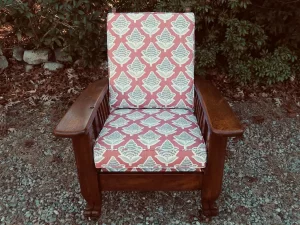 Antique Morris Chair with a solid Oak frame and loose seat and back Cushions. All new seat and back CertiPur-US foam inserts. Cushions upholstered using a Kate Scarlet Floral fabric. Cushions fabricated by Cape Cod Upholstery Shop | Located in South Dennis, MA 02660