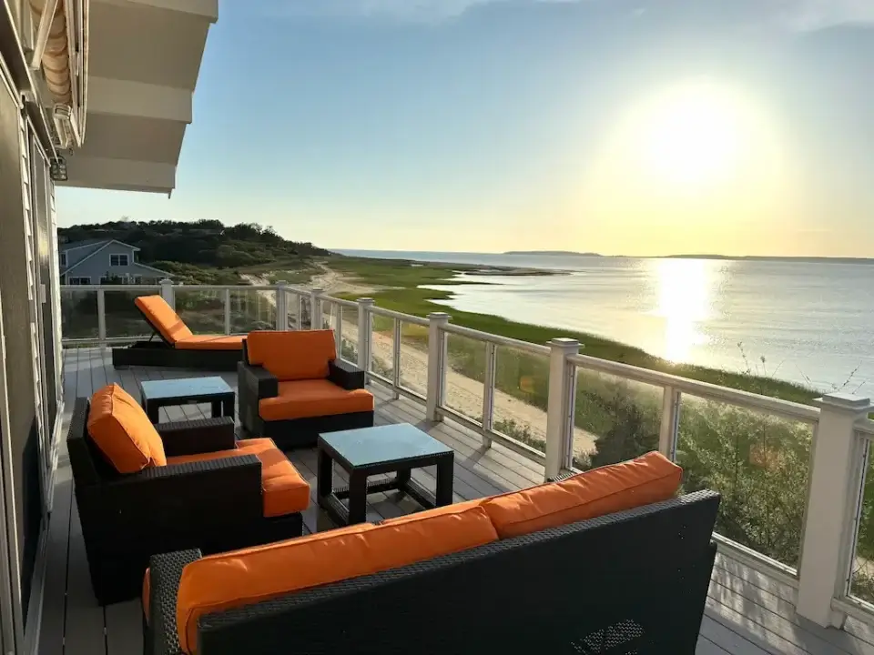 Cape Cod Sunbrella deck chairs, loveseat & chaise lounge cushions at sunset. Cushions fabricated by Joe Gramm of Cape Cod Upholstery Shop | South Dennis, MA 02660