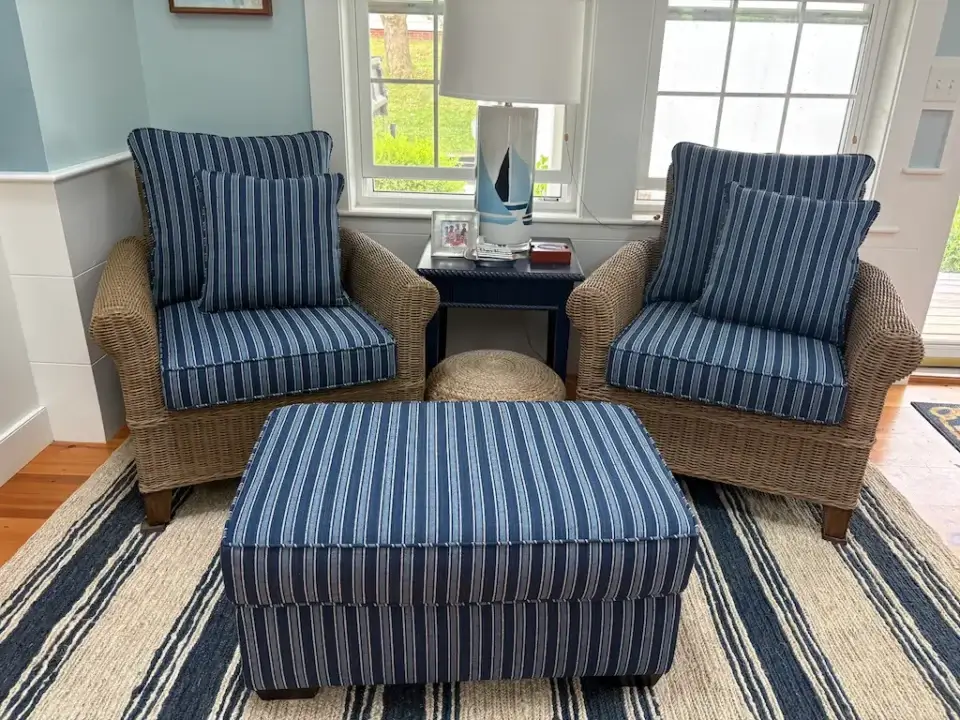 Wicker chairs, ottoman & matching throw pillows. Cushions fabricated by Joe Gramm of Cape Cod Upholstery Shop | South Dennis, MA 02660