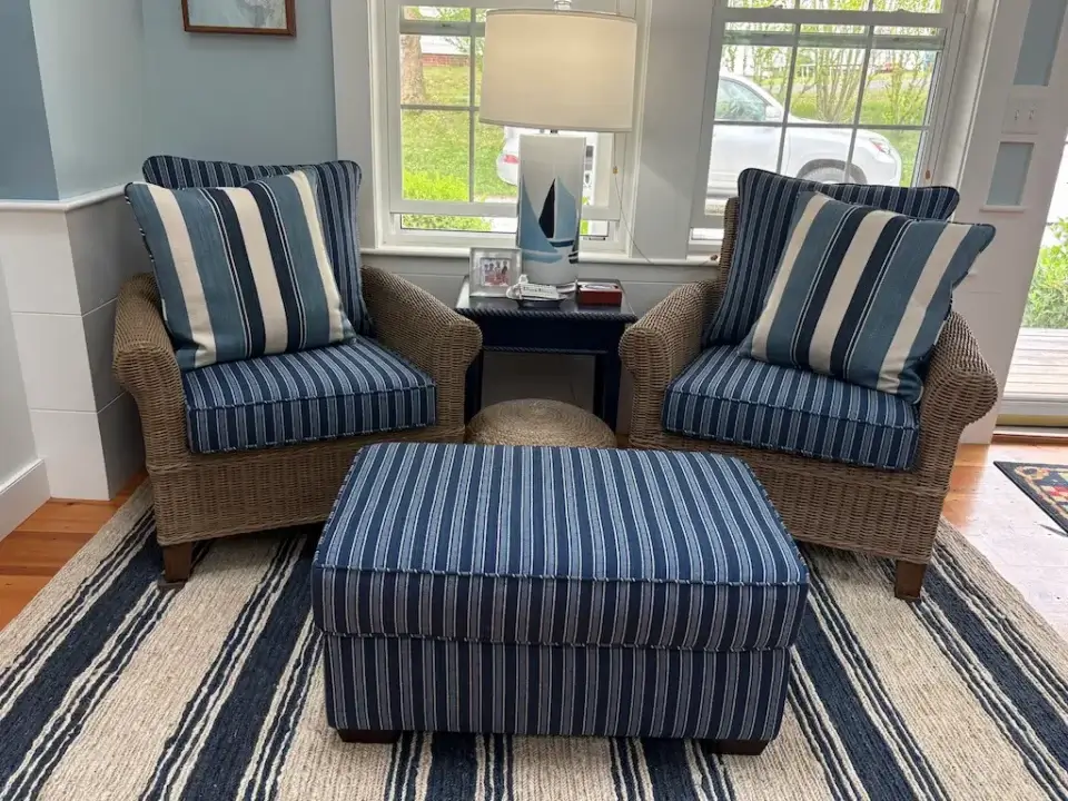 Wicker chairs, ottoman & contrasting throw pillows. Cushions fabricated by Joe Gramm of Cape Cod Upholstery Shop | South Dennis, MA 02660
