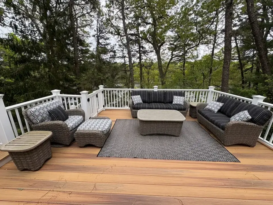 Cape Cod outdoor wicker sofa, loveseat, chair & ottoman with Sunbrella cushions. Cushions fabricated by Joe Gramm of Cape Cod Upholstery Shop | South Dennis, MA 02660