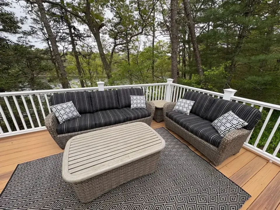 Cape Cod outdoor wicker sofa & loveseat with Sunbrella cushions. Cushions fabricated by Joe Gramm of Cape Cod Upholstery Shop | South Dennis, MA 02660