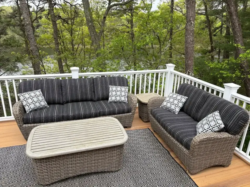 Cape Cod outdoor wicker sofa & loveseat with Sunbrella cushions. Cushions fabricated by Joe Gramm of Cape Cod Upholstery Shop | South Dennis, MA 02660