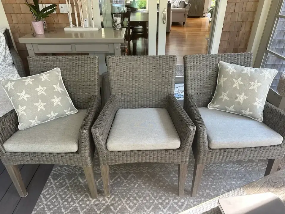 Woven Dining chairs with loose cushions. Cushions fabricated by Joe Gramm of Cape Cod Upholstery Shop | South Dennis, MA 02660