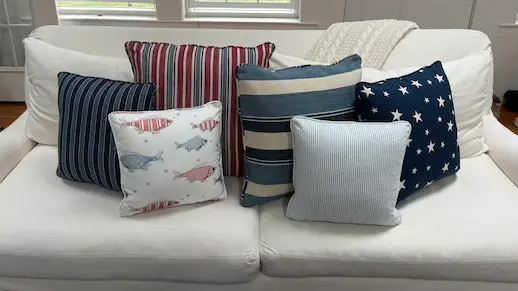 Collection of throw pillows of various sizes and fabric patterns. Cushions fabricated by Joe Gramm of Cape Cod Upholstery Shop | South Dennis, MA 02660
