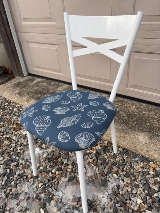 Bathroom chair, side view, upholstered in Sunbrella. Upholstered by Joe Gramm of Cape Cod Upholstery Shop - South Dennis, MA 02660