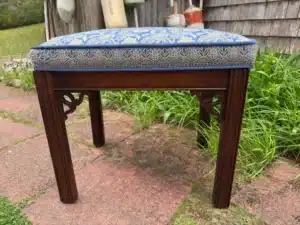 Chippendale foot stool upholstered in an Egyptian style fabric. Upholstered by Joe Gramm of Cape Cod Upholstery Shop - South Dennis, MA 02660